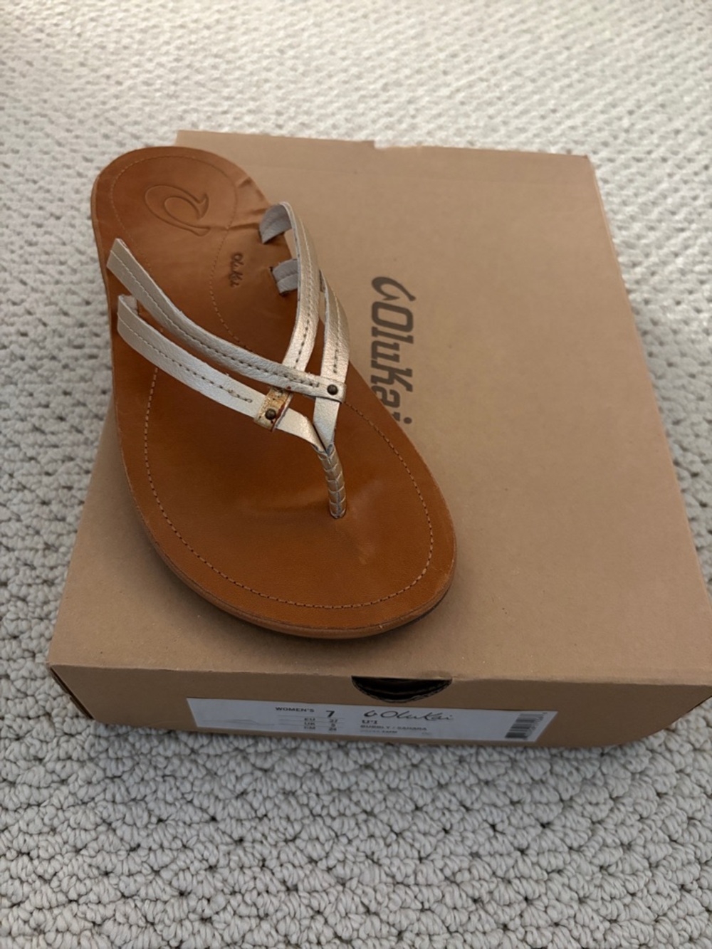 OluKai Women’s Metallic Beige Braided Leather Thong Sandal